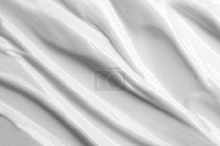 Beauty cream texture. Cosmetic lotion background. Creamy skincare product closeup.
