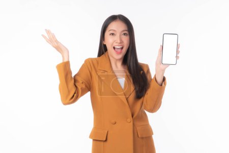 Photo for Portrait of beautiful Asian young woman showing smart phone with blank screen , white screen  empty copy space for advertising banner isolated on white background , Mock Up Image - Royalty Free Image