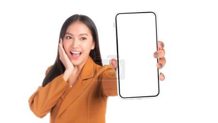 Photo for Beautiful Asian young woman ,Excited surprised girl showing smart phone with blank screen , white screen for Mobile App Advertising isolated on white background , smart phone display Mock Up Image - Royalty Free Image