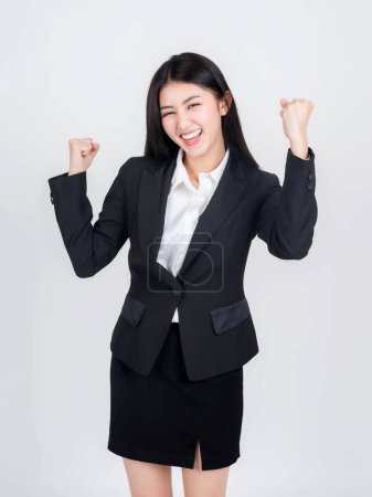 Photo for Portrait beautiful working Asian woman with happiness raise both arms celebrating success isolated on white background - business concept - Royalty Free Image