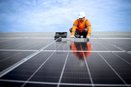 Foto de Working on solar project installing panels or modules as renewable energy source. - Imagen libre de derechos