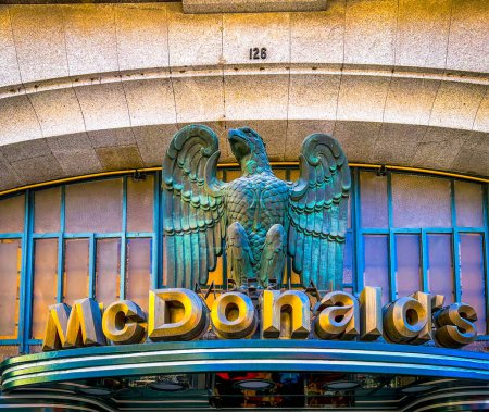 Photo for Porto, Portugal- 2022, December 1. sign of McDonalds restaurant in world, was opened in 1995. name Imperial comes from eagle on facade. This is one of most unusual McDonald's restaurants in world. - Royalty Free Image