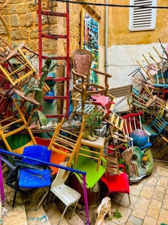 Photo for Acre, Israel - January 6, 2023: Alley of Surprises by artist Walid Kashash in ancient Akko. Street art. End-of-life items, recycling, are breeding ground for creativity, in corners and alleys of Akko - Royalty Free Image