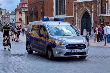 Photo for Krakow Poland August 7, 2022: Straz Miejska Municipal police car are law enforcement agencies that are under the control of local government. This includes the municipal government. - Royalty Free Image