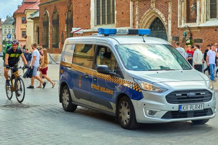 Photo for Krakow Poland August 7, 2022: Straz Miejska Municipal police car are law enforcement agencies that are under the control of local government. This includes the municipal government. - Royalty Free Image