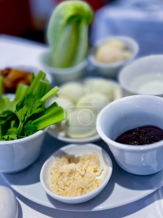 Photo for The main meal on Pesach is the Passover evening, or seder. the main dish is a plate for the seder. in Hebrew - keara. There are 6 products on it - an egg and a chicken wing, greens, water, etc. - Royalty Free Image