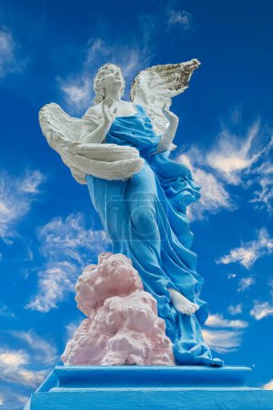 Photo for Angel statue among the Mausoleums and Crypts at the cemetery slums at the North Cemetery in Manila, Philippines - Royalty Free Image