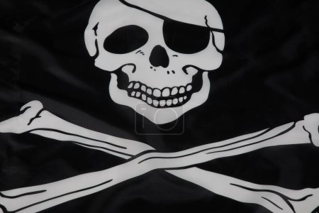 Téléchargez les photos : Crâne et os croisés des pirates noirs Drapeau aka le Jolly Roger - en image libre de droit