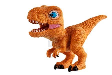 Foto de Un dinosaurio de juguete de plástico aislado sobre un fondo blanco con espacio para copiar - Imagen libre de derechos