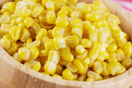 Photo for Close up of a wooden bowl of delicious Sweet Corn with copy space - Royalty Free Image