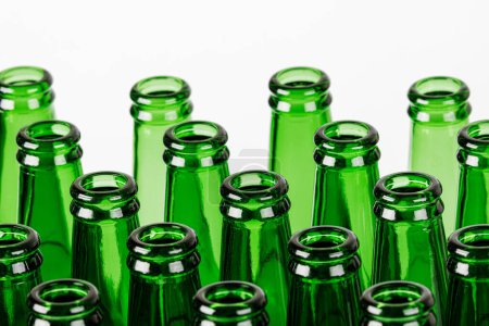 Photo for Close up of empty Green Beer Bottles Isolated on a white background with copy space - Royalty Free Image