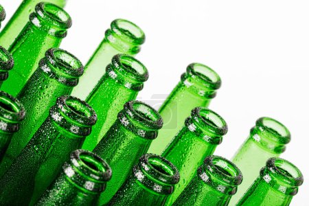 Photo for Close up of empty Green Beer Bottles Isolated on a white background with copy space - Royalty Free Image