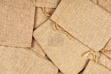 Photo for Several Burlap Sacks or Bags isolated with copy space - Royalty Free Image