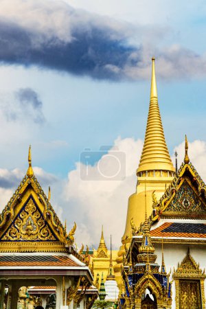 Photo for Traditional structures decorated in gold at the Grand Palace in Bangkok Thailand - Royalty Free Image