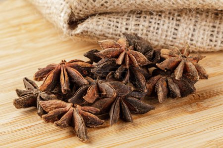 Photo for Close up of Star Anise Spices isolated on a wooden background with copy space - Royalty Free Image