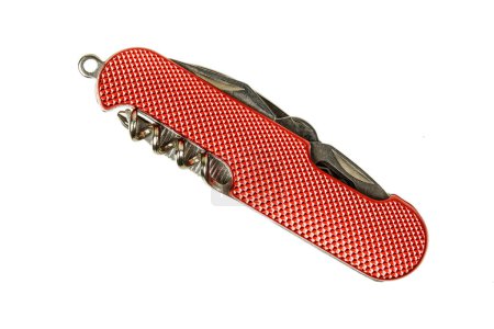 Foto de Primer plano de un cuchillo de bolsillo rojo aislado sobre un fondo blanco con espacio para copiar - Imagen libre de derechos