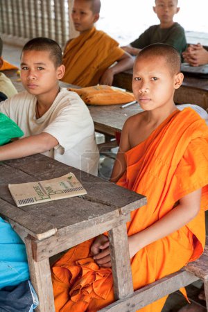 Photo for A very young child studing to be a Buddhist Monks in Cambodia, Southeast Asia - Royalty Free Image