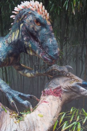 Téléchargez les photos : Deinonychus (griffe terrible) se nourrissant de dinosaures Parasaurolophs du début du Crétacé. Je pensais avoir chassé en meutes et avoir mangé de la viande. Site fossile : États-Unis - en image libre de droit
