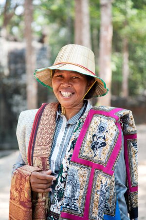 Photo for One of the many faces of a woman selling souvenirs at Angkor Wat Cambodia, Southeast Asia - Royalty Free Image