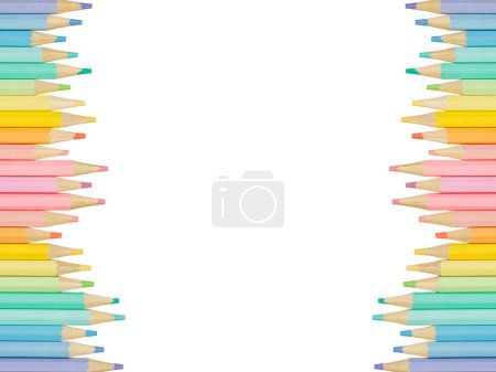 Photo for Top down or flat lay of a boarder of colorful pastel colored pencils isolated on a white background with cop space - Royalty Free Image