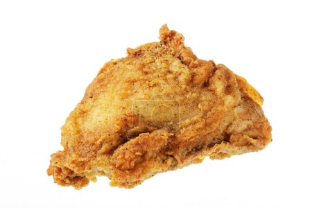 Foto de Primer plano del muslo de pollo frito sobre un fondo blanco con espacio de copia - Imagen libre de derechos