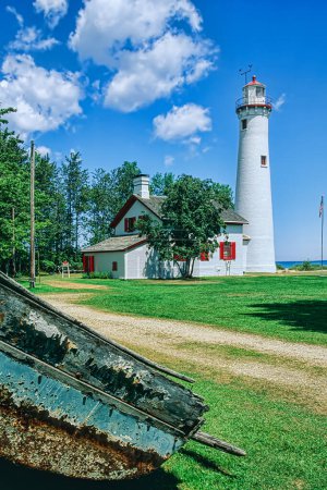 Photo for Sturgeon Point Lighthouse was built in 1870 and is located on the tip of Sturgeon Point on Lake Huron in Michigan, United States, North America with copy space - Royalty Free Image