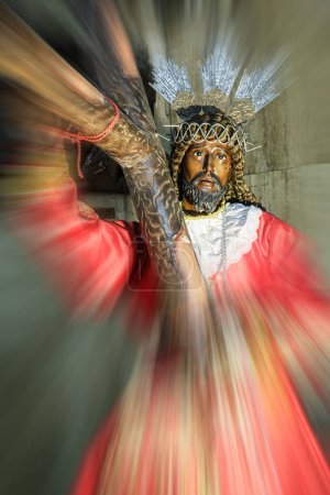 Photo for Statue of the Black Nazarene or Black Jesus in the Minor Basilica of the Black Nazarene motion blur affect also known as Quiapo Church in Mamila, Philippines, Southeast Asia - Royalty Free Image