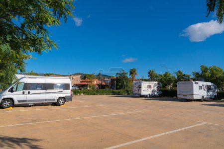 Photo for Motorhomes and campers using services at Area d`autocaravanes Spanish aire in La Selva del Camp, Tarragona Province, Spain on Friday 30th September 2022 - Royalty Free Image