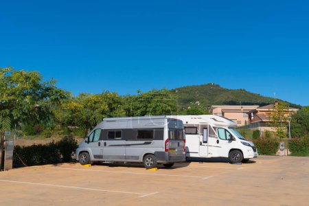 Photo for Motorhomes and campers using services at Area d`autocaravanes Spanish aire in La Selva del Camp, Tarragona Province, Spain on Friday 30th September 2022 - Royalty Free Image