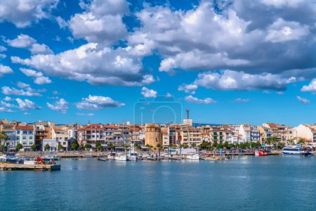 Photo for Cambrils seafront Spain boats and buildings in Tarragona Province Catalonia with blue Mediterranean sea and sky - Royalty Free Image