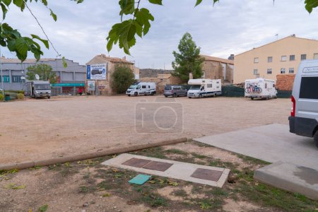 Photo for Motorhomes and campervans using services at Area Municipal Alcaniz Spanish aire Teruel province Aragon, Spain on Monday 24th October 2022 - Royalty Free Image