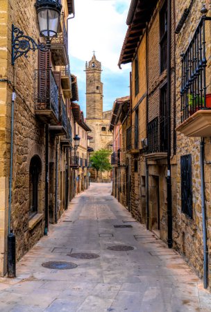 Elciego Spain narrow street and church in town centre Alava Basque Country 