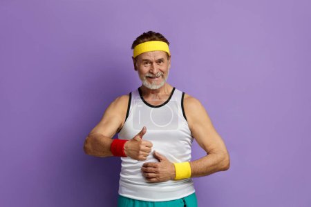 Photo for Man Showing Thumb Up. Bearded Grandfather Showing Finger Up, Like, Agree Hand Gesture Posing Isolated On Violet Background Studio - Royalty Free Image