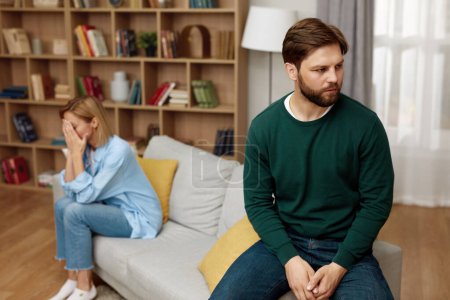 Téléchargez les photos : Couple Having Argument At Home. Angry Spouses Dont Speak With Each Other. Frustrated Husband And Annoyed Wife Quarrelling About Bad Marriage Relationships - en image libre de droit