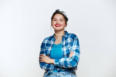 Foto de Plus Size Woman Smiling Isolated. Portrait of Bossy Woman Looking at Camera, Feeling Confident, Posing. Indoor Studio Shot Isolated on White Background - Imagen libre de derechos