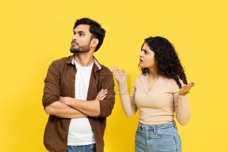 Disagreement Concept With Young Couple Arguing On Yellow Background, Relationship Difficulties, Communication Issues