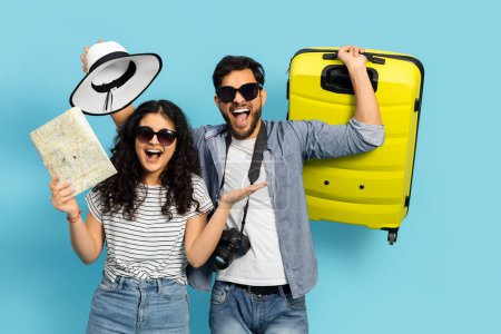 Photo for Happy Couple Traveling With Map And Suitcase, Summer Vacation, Holiday Trip, Adventure, Tourism - Royalty Free Image