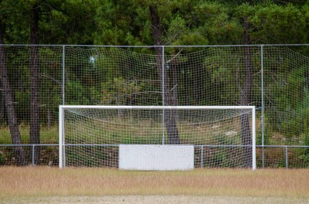 Photo for Goal for a dirt soccer field for amateur competitions - Royalty Free Image