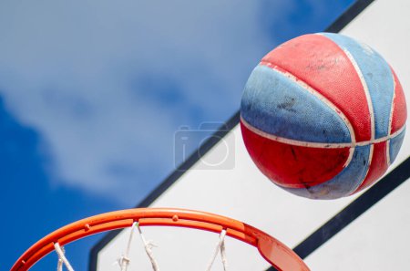 Photo for Selective focus, basketball ball and a basketball basket - Royalty Free Image