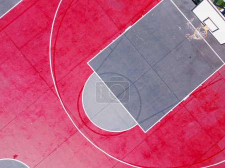 zenithal aerial drone view of a basketball court