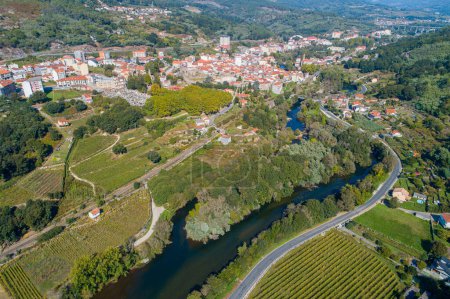 Photo for Aerial view with drone of the river Avia and the town of Ribadavia. Ourense, Galicia. Spain - Royalty Free Image
