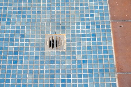 Photo for Shower drainage from a swimming pool unused due to dryness - Royalty Free Image
