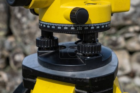 Photo for Theodolite in an archaeological excavation, surveying tool for measuring elevations - Royalty Free Image