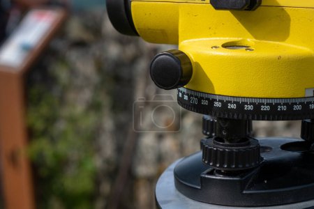 Photo for Theodolite in an archaeological excavation, topographic tool for measuring elevations. Close up - Royalty Free Image