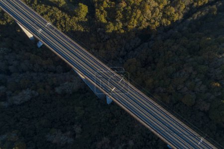 aerial view of a high speed train viaduct at dusk