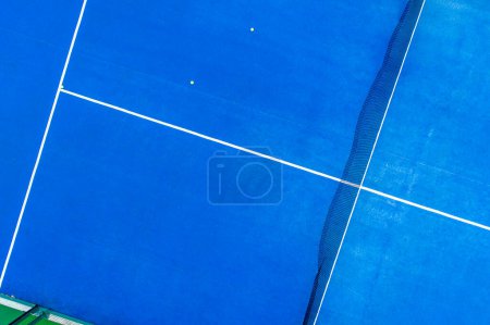 blue paddle tennis court aerial sight with drone