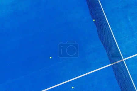 blue paddle tennis court aerial shot by drone