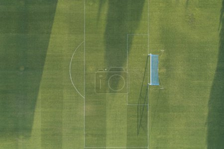 overhead aerial view with drone of a natural grass football field