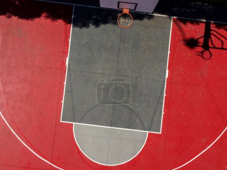 Photo for Aerial view of a basketball court painted red - Royalty Free Image