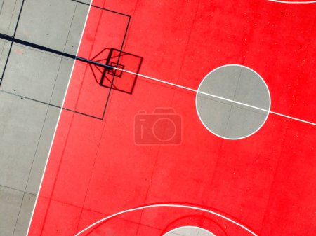 Photo for Aerial view of a red painted basketball court - Royalty Free Image